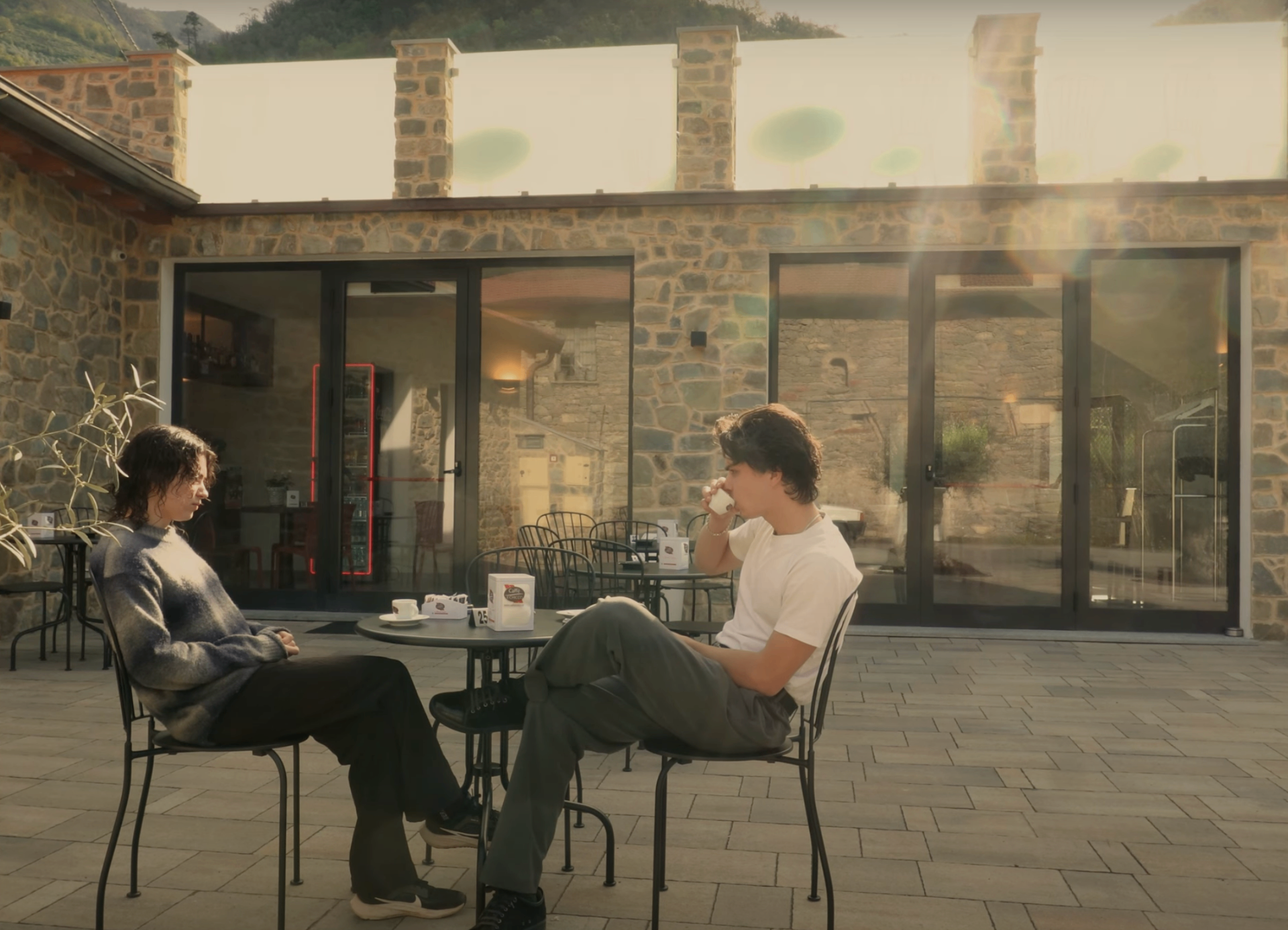 Young entrepreneurs having coffee outdoors